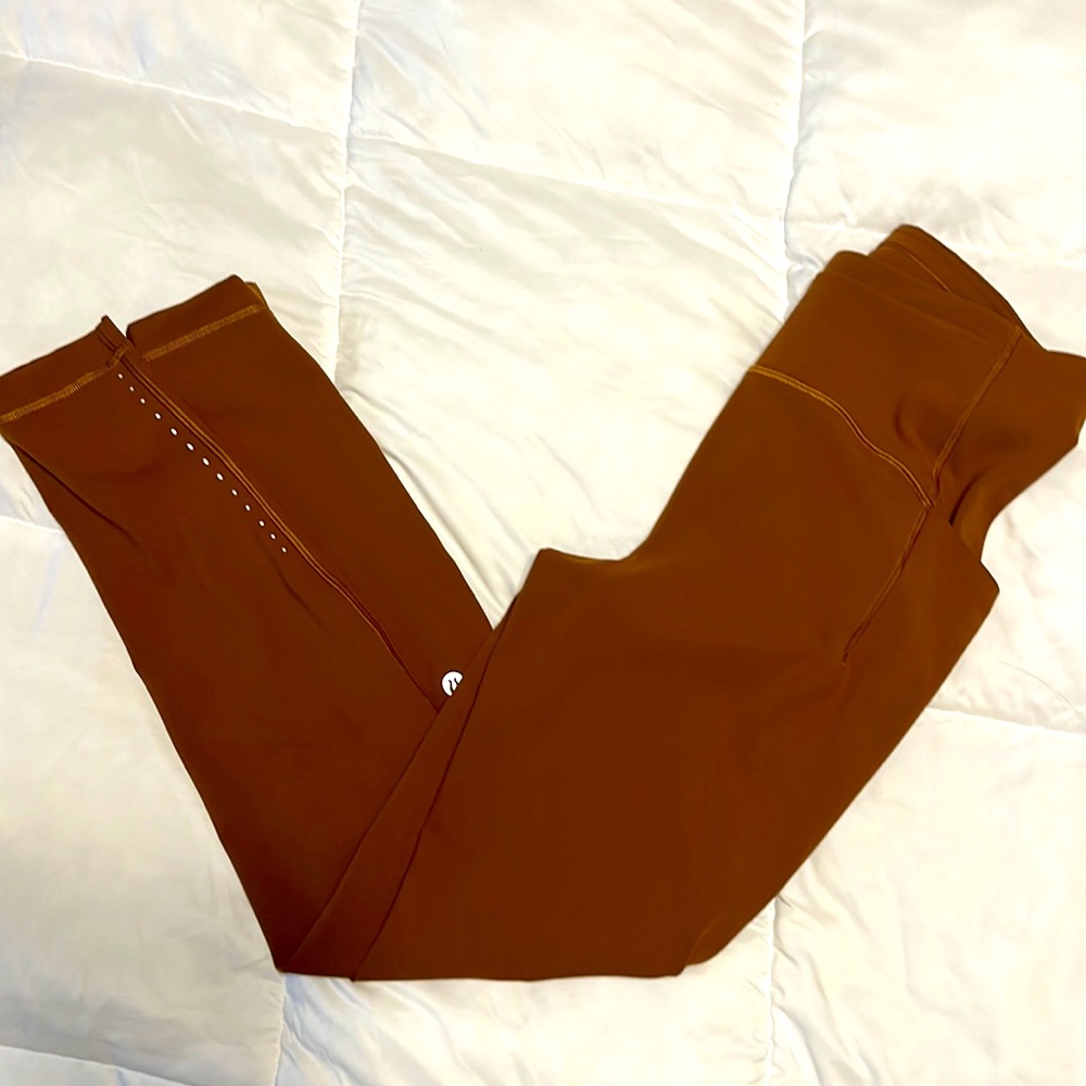 Lululemon Swift Speed running legging size 8 - copper brown.